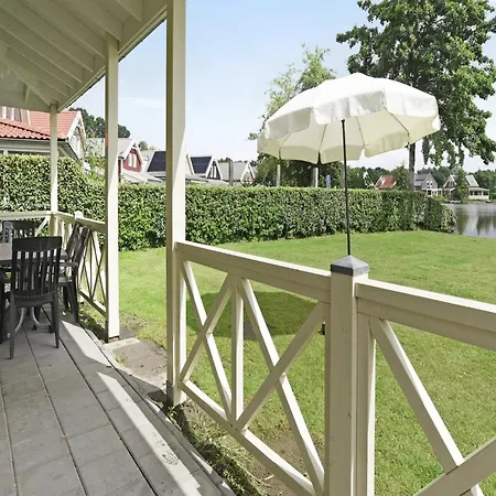 On The Water With Veranda Holiday home Simonshaven